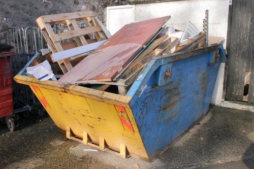 Professionals conducting house clearance in a Victorian home