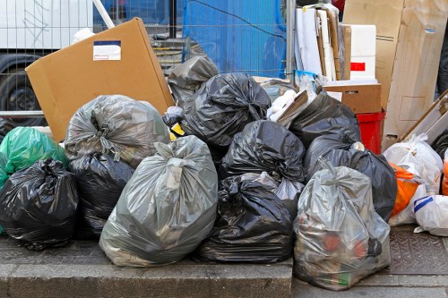 Technicians sorting items during a flat clearance in Victoria